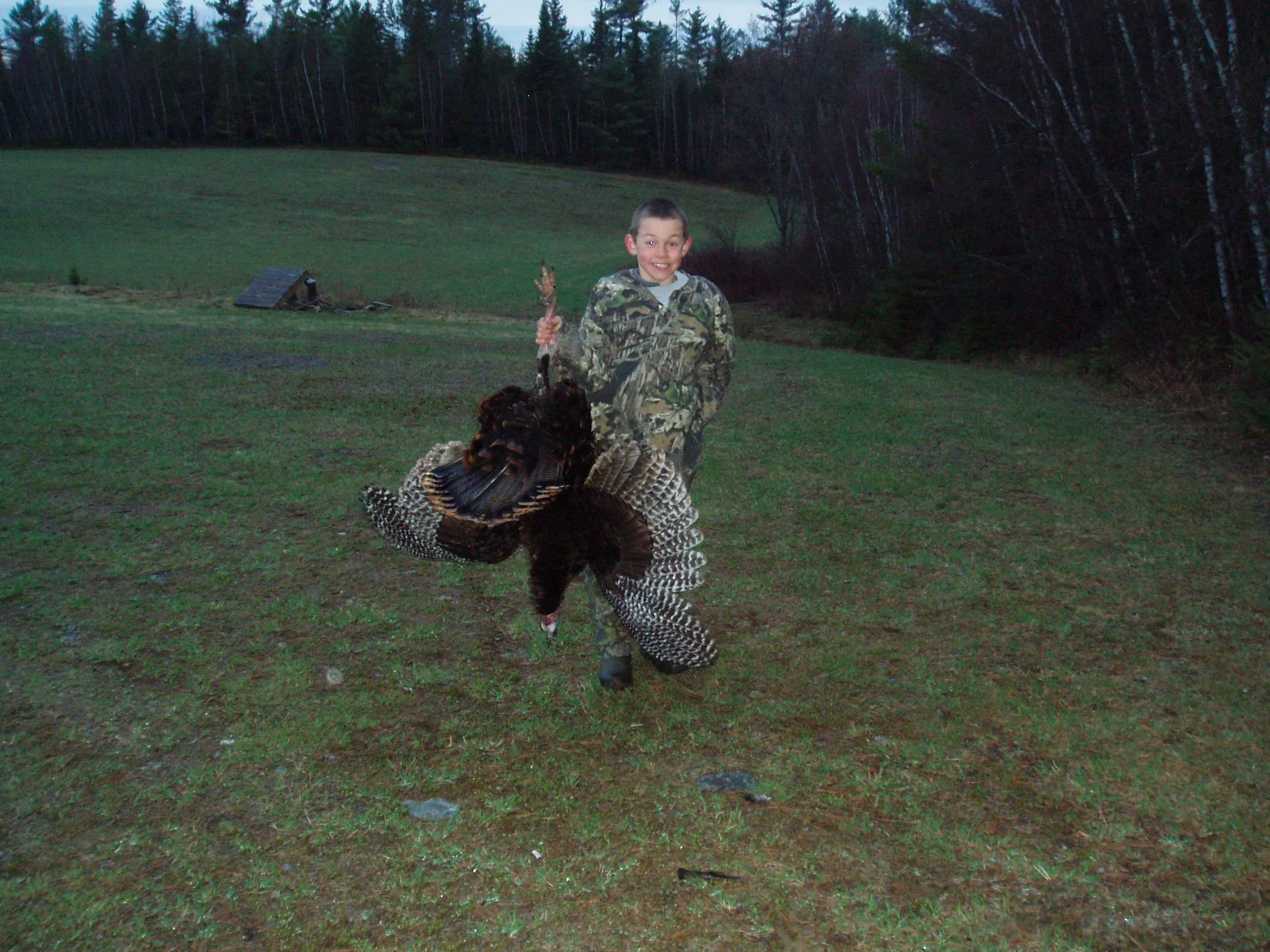 Youth hunter with turkey